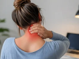 Woman gently holding the back of her neck